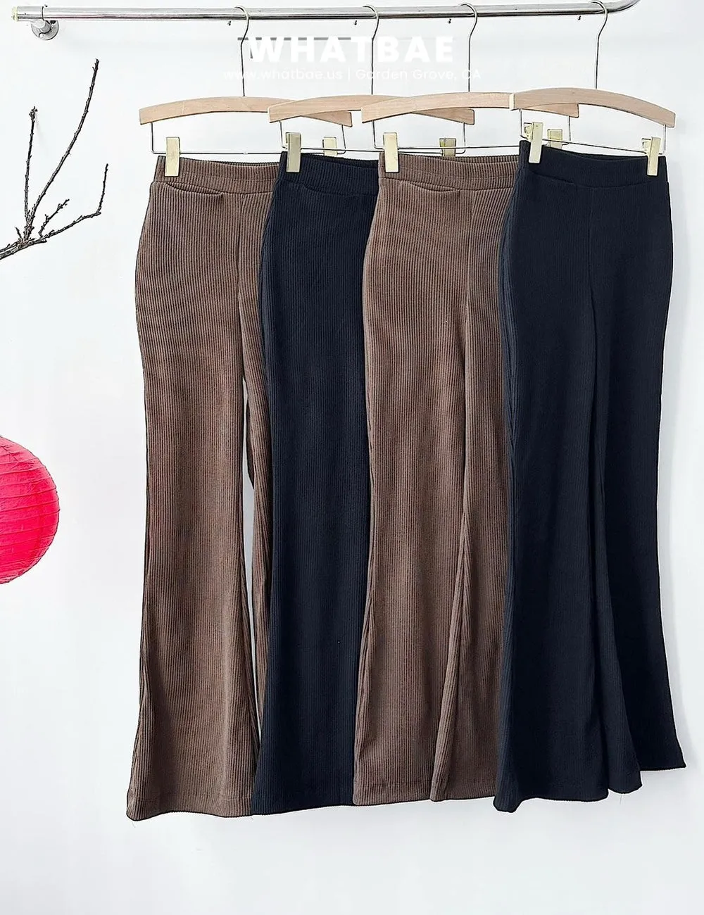 Elastic pants made of thick fabric with slight flared legs